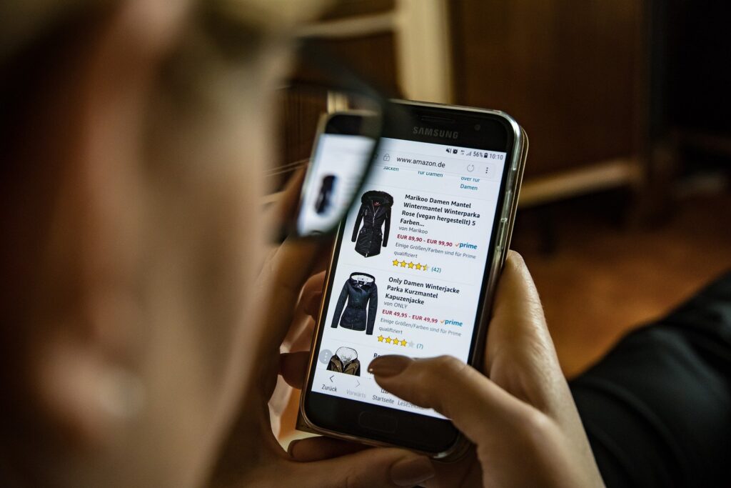 Person using Phone- 14 Laws of Marketing