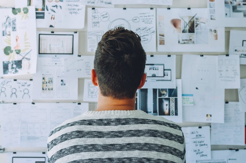 Person in front of whiteboard: 